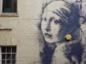 banksy mural graffiti bristol girl with the pierced eardrum uk banksy art 2